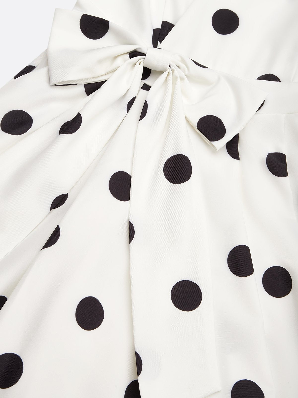 Robe midi sans manches à pois noir et blanc
